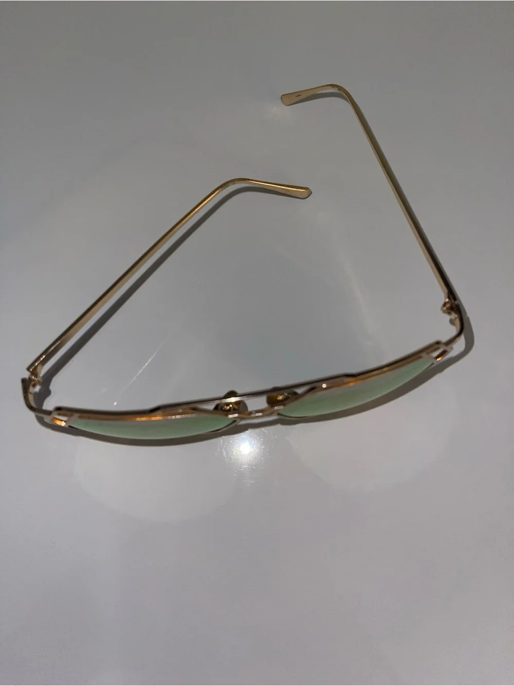 Geometric Gold-Frame Sunglasses with Pink Mirrored Lenses
